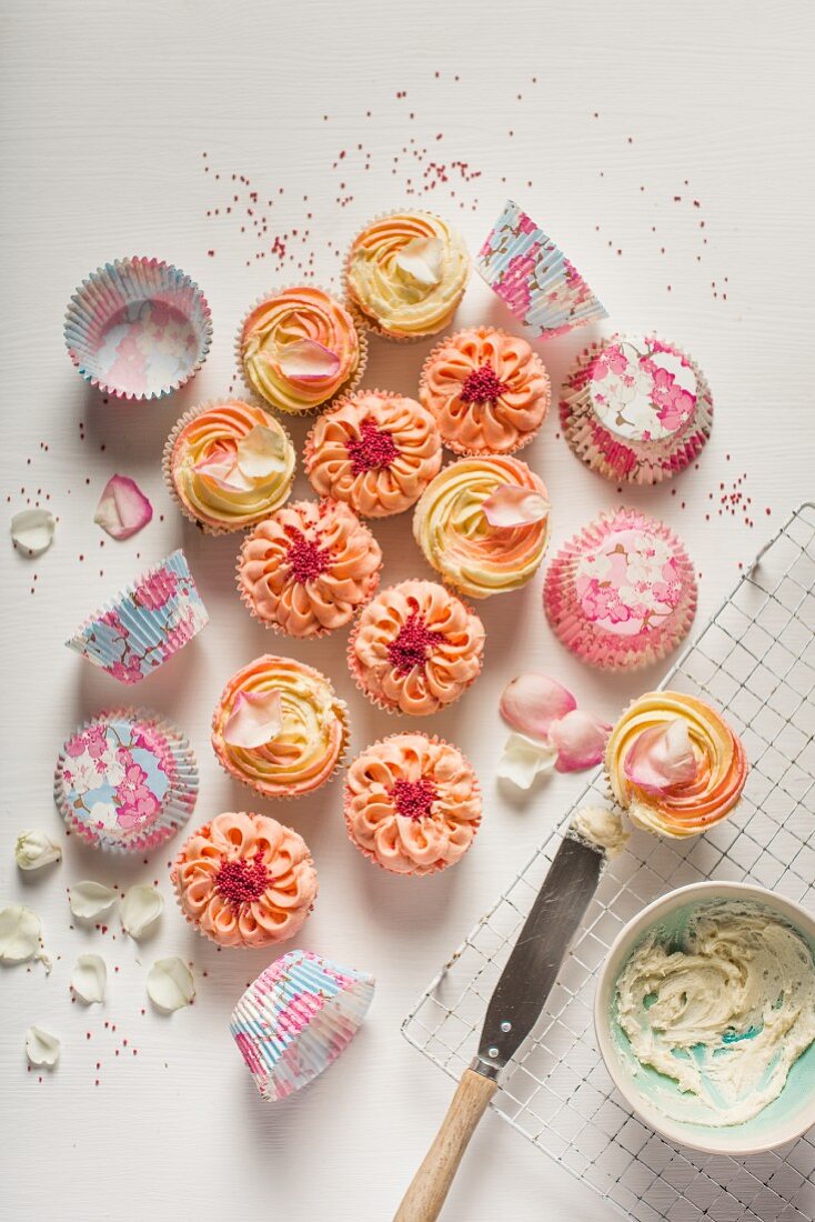 Cupcakes with pink and yellow icing