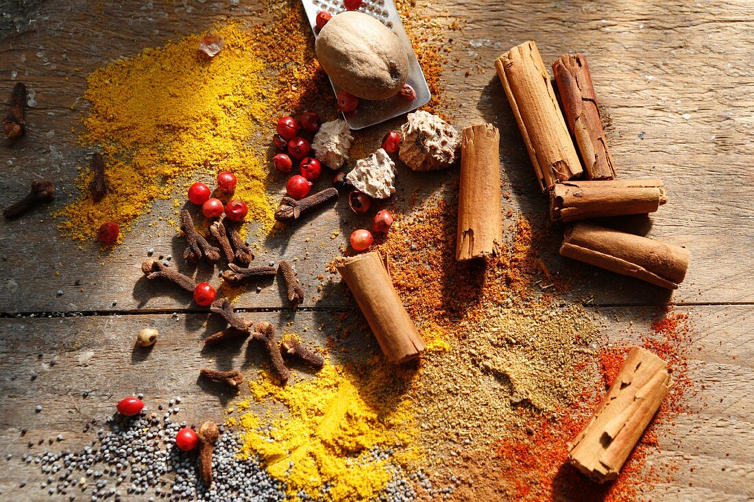Various oriental spices on a wooden table