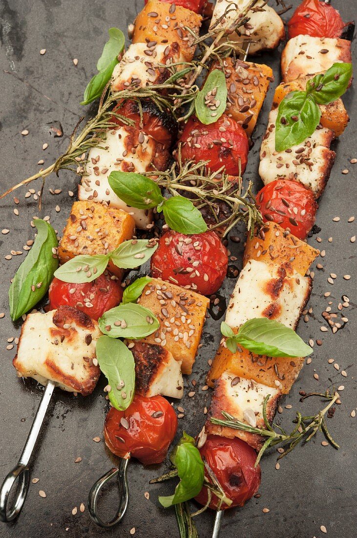 Grilled vegetable skewers with pumpkin, tomato, feta and herbs