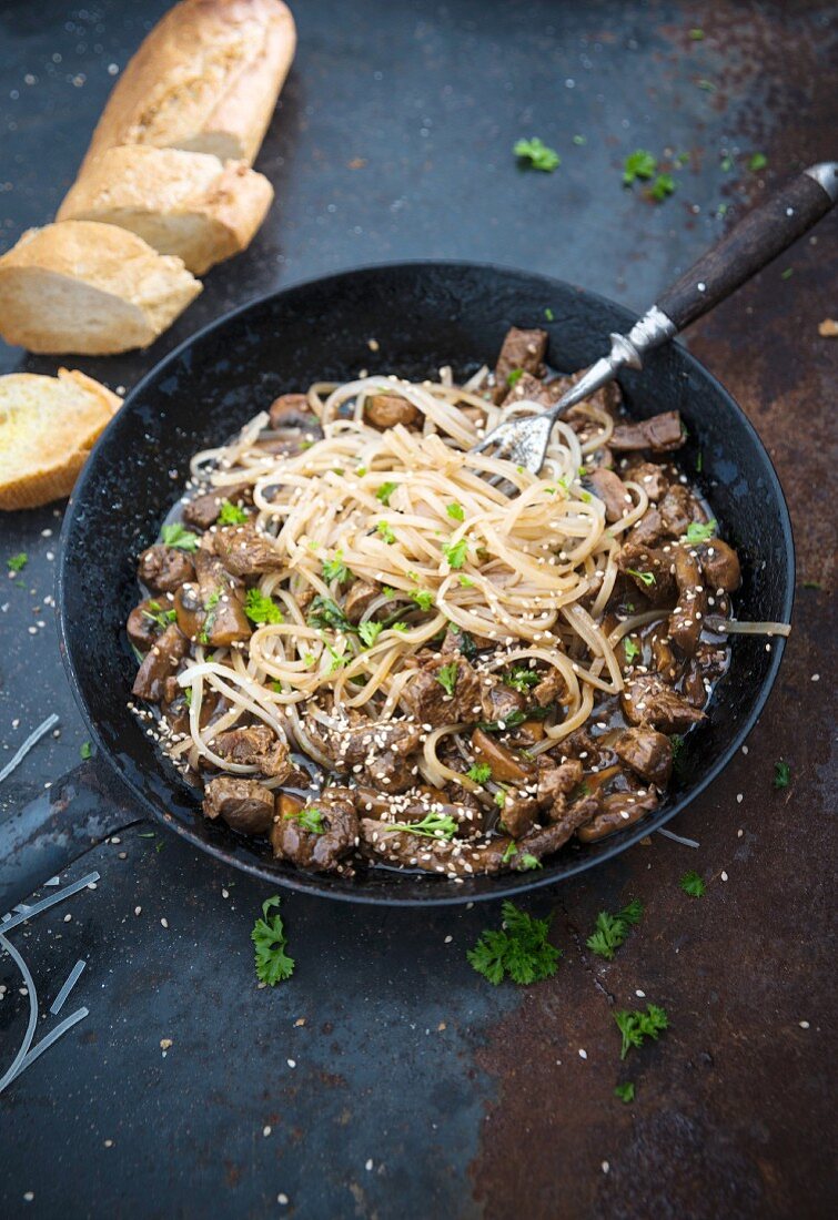 Vegan goulash with tapioca linguine and sesame seeds