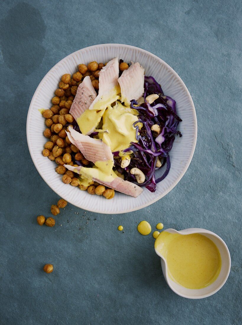 Cashew and red cabbage bowl with chickpeas and smoked fish