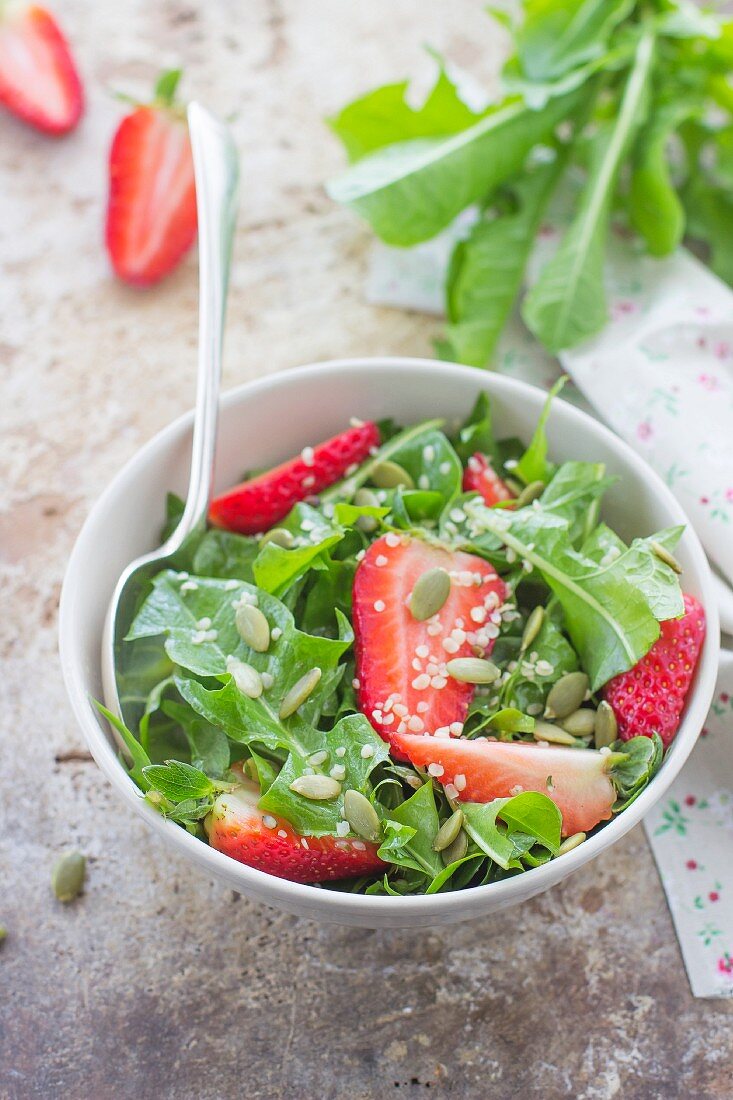 Dandelion salad with strawberries