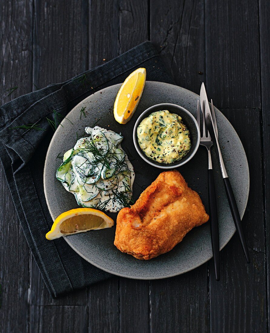Fish in batter with cucumber salad and tartar sauce