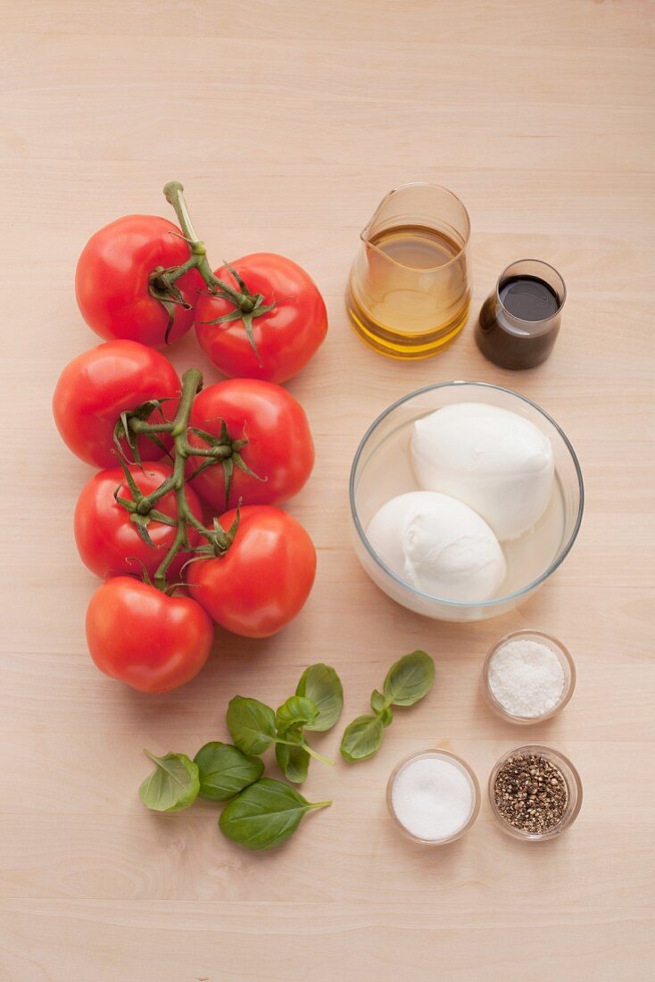 Ingredients for caprese salad with basil pesto