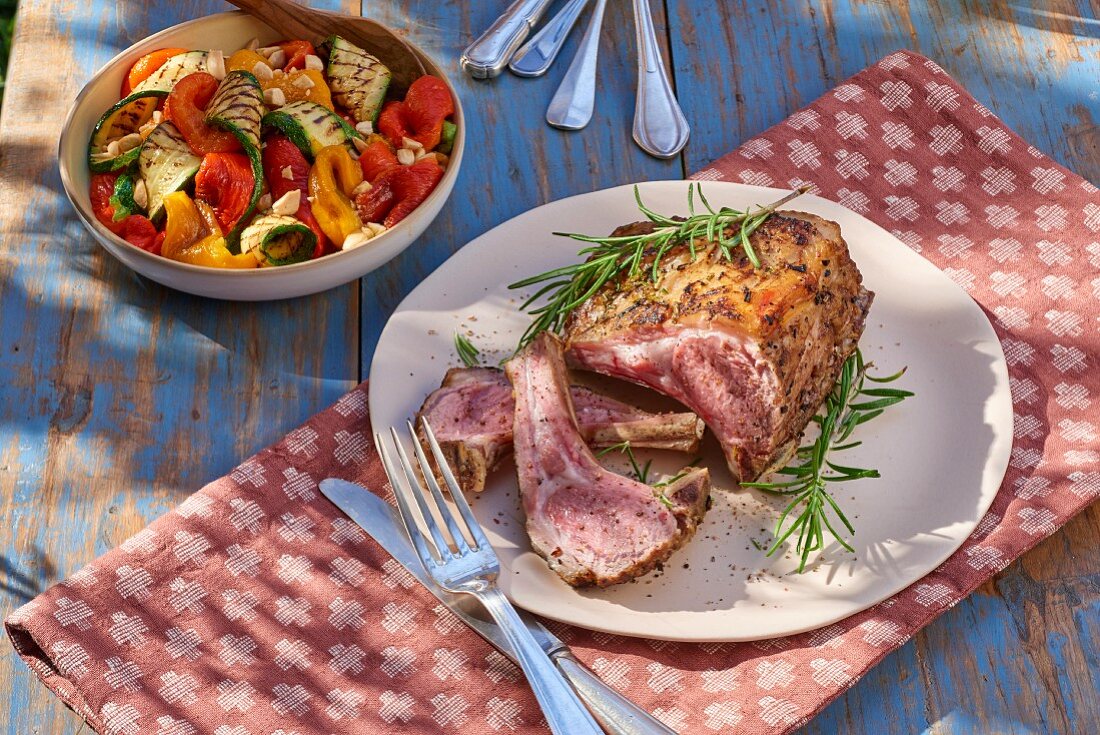 A rack of lamb with rosemary and grilled vegetables