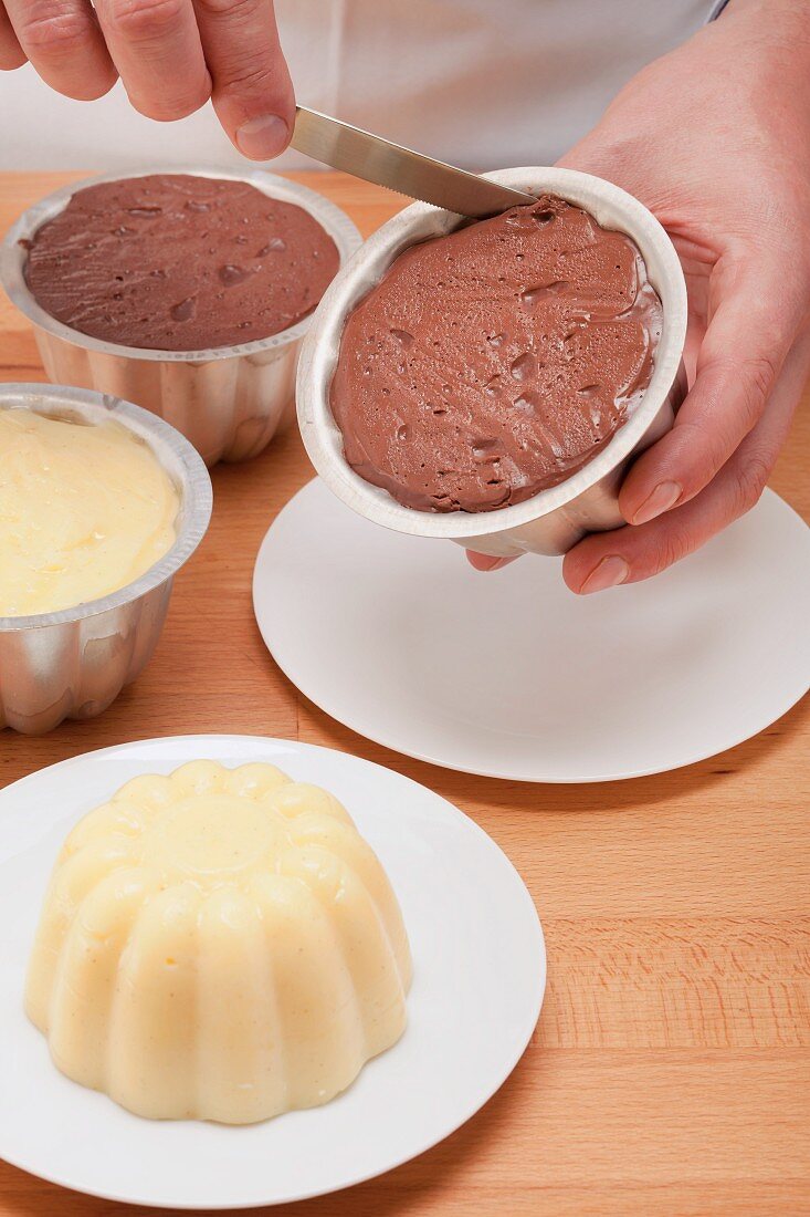 Removing puddings from the moulds