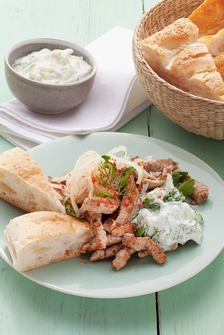Greek-style kebab meat with garlic and dill quark