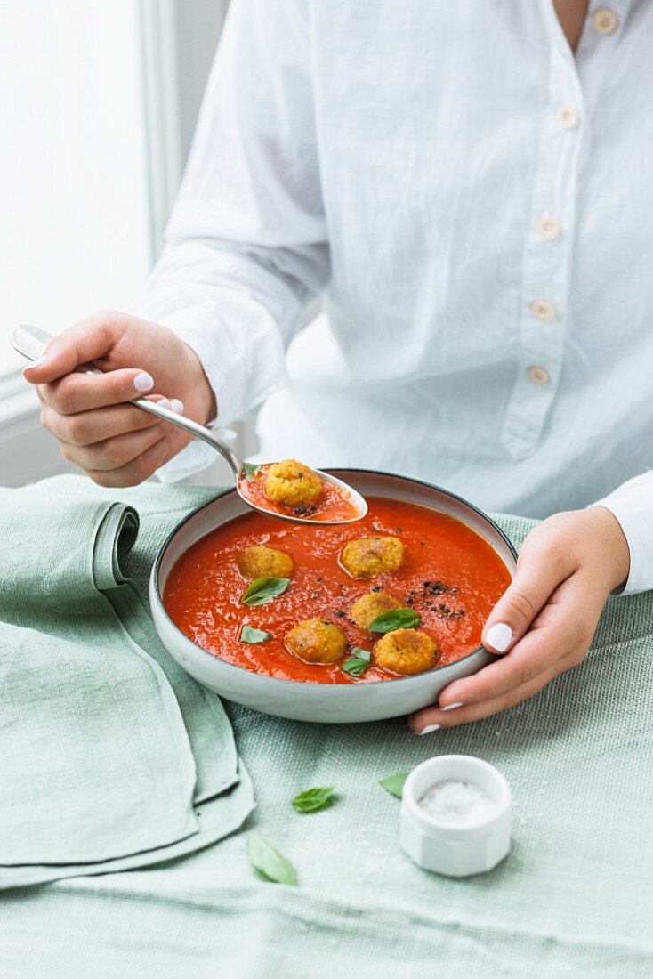 Tomato soup with lupin and couscous balls