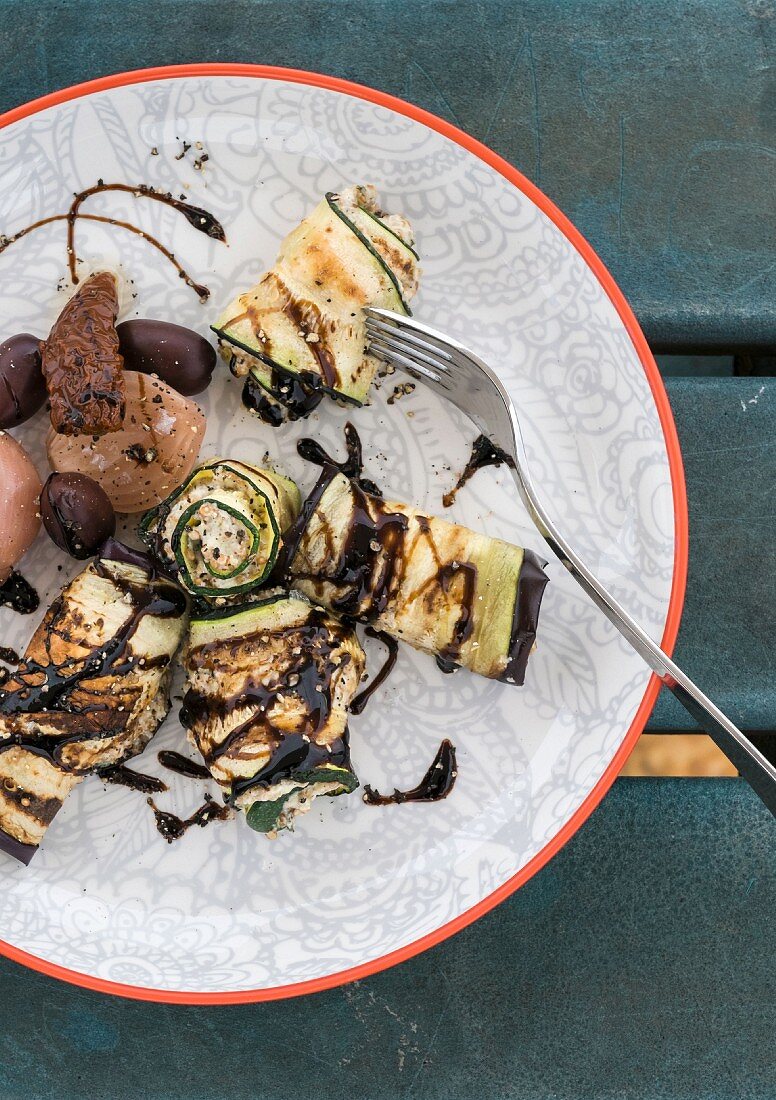 Aubergine and courgette rolls with cream cheese and balsamic dressing