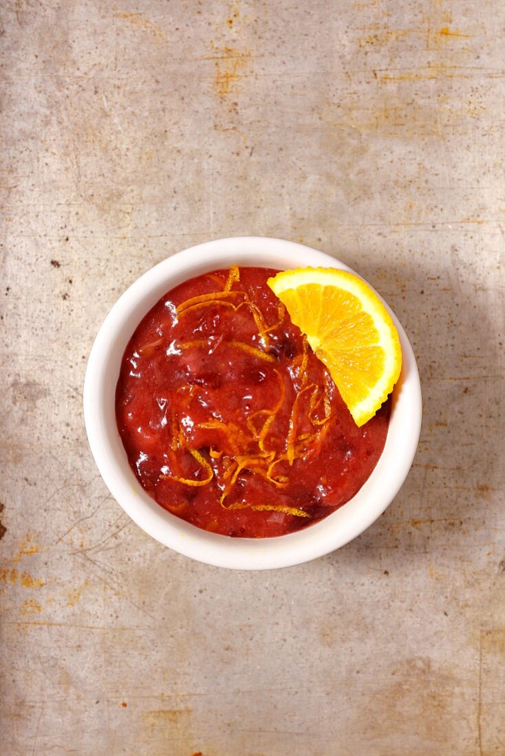 Cumberland sauce in a small bowl on a stone background