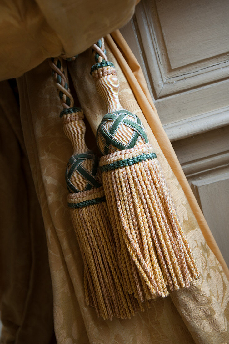 Classic tassels on gathered curtains