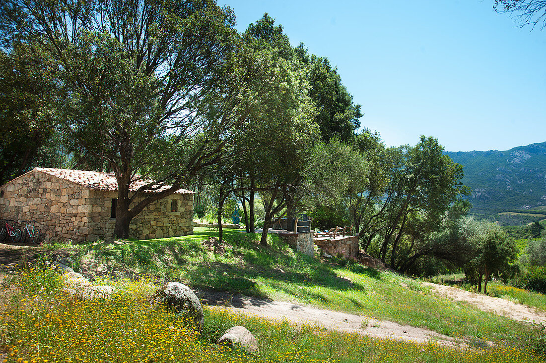 Stone house in Mediterranean landscape