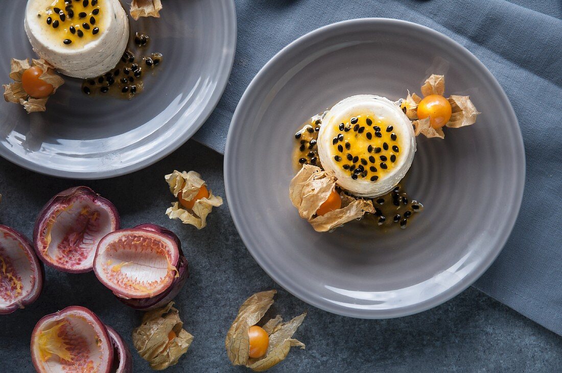 Passion fruit panna cotta garnished with physalis (seen from above)