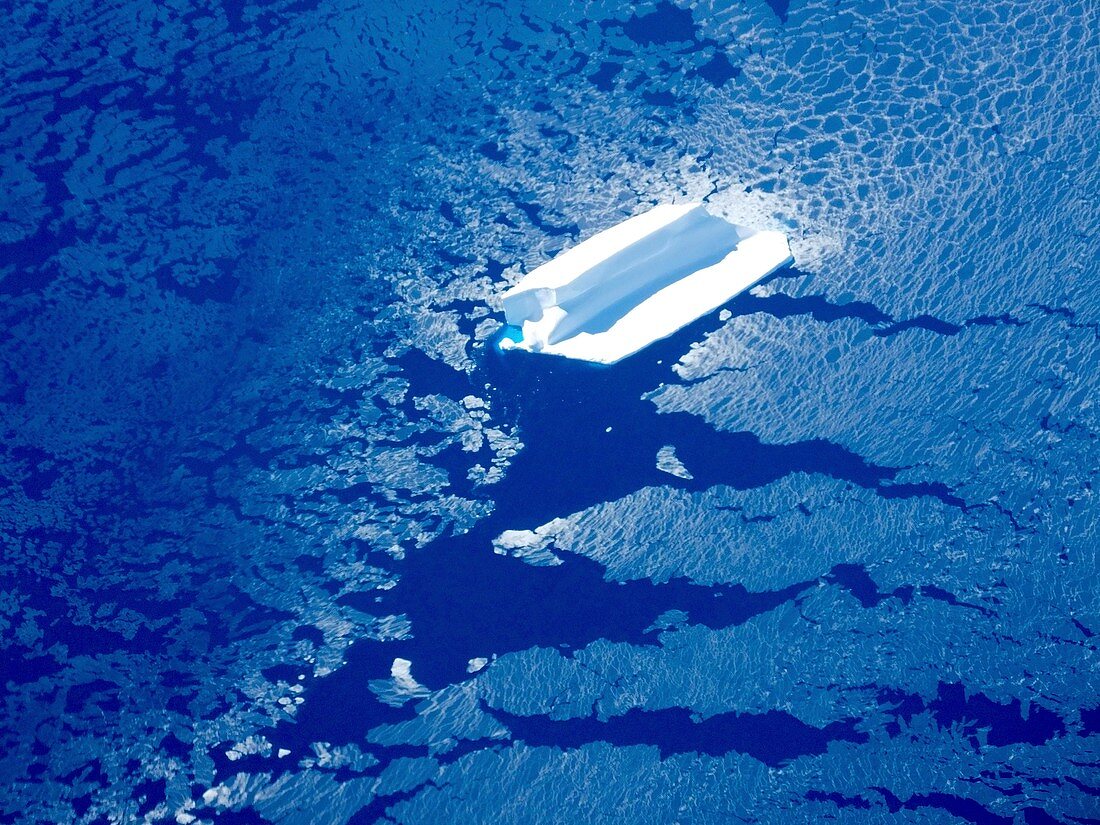 Iceberg with attached sea ice, Antarctica
