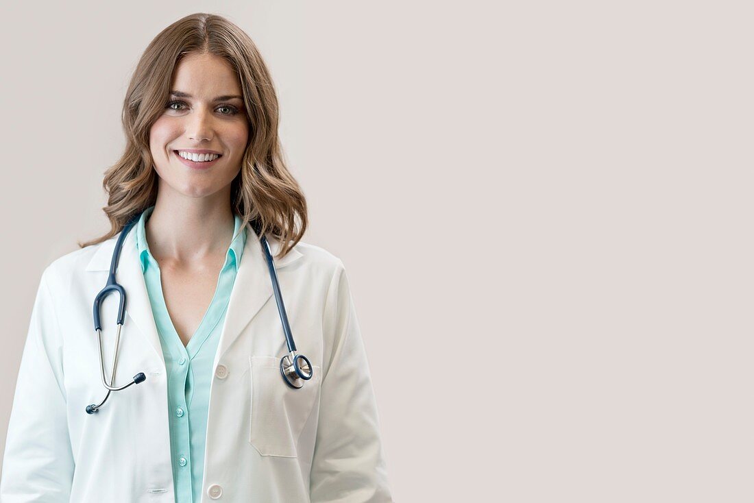 Female doctor smiling towards camera