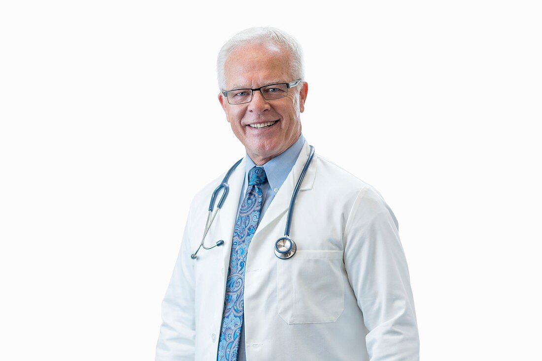 Senior male doctor smiling
