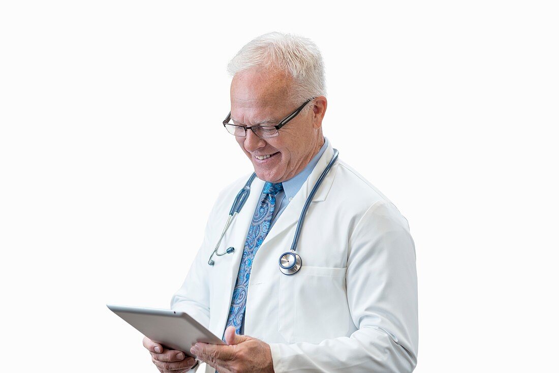 Senior male doctor with digital tablet