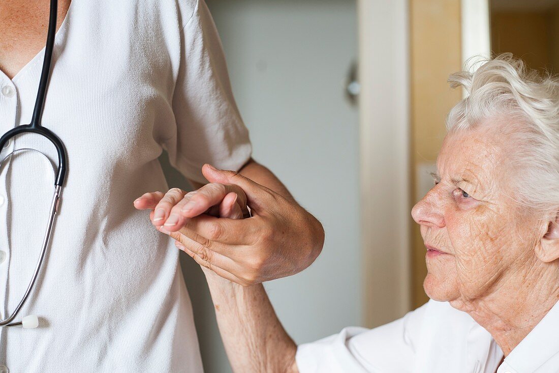 Doctor and elderly woman