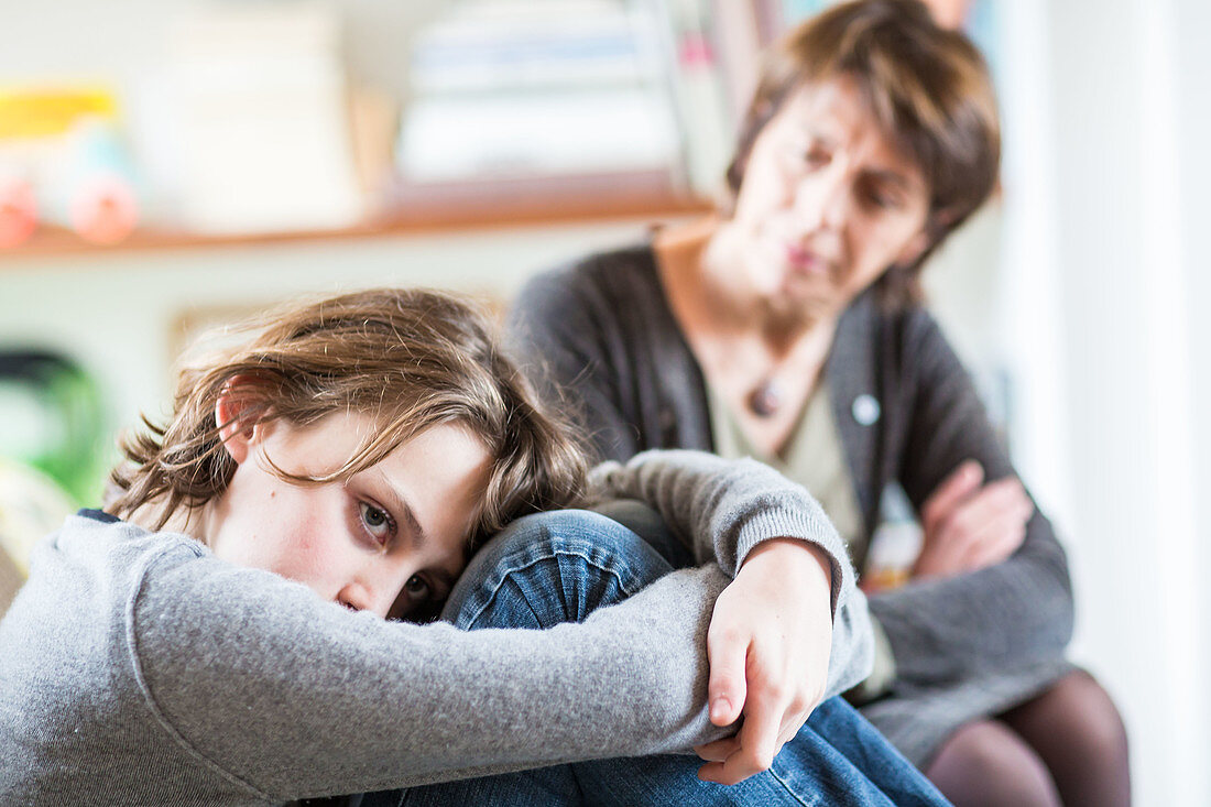 Woman discussing with a teenager