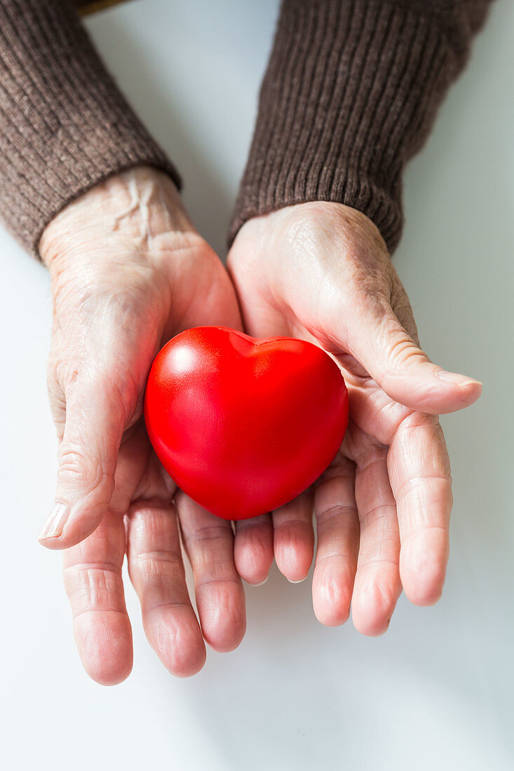 Woman holding heart