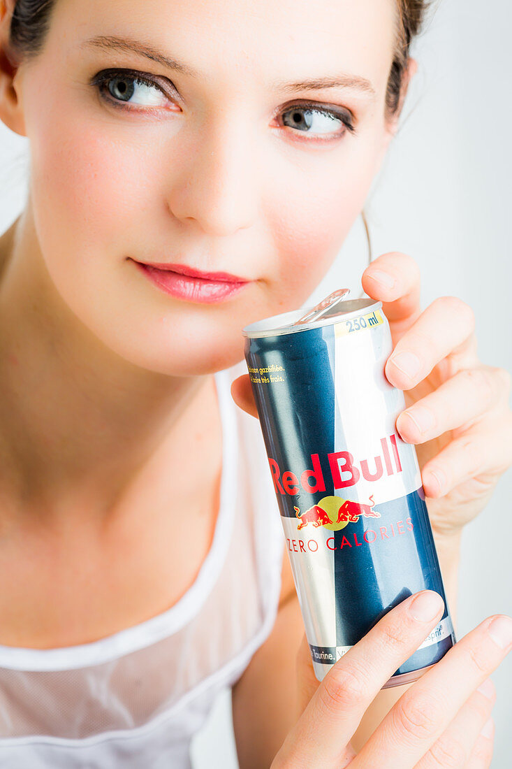 Woman drinking Red Bull