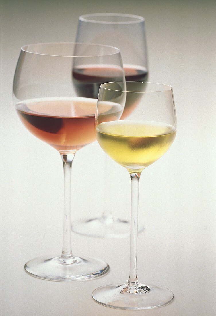 A glass each of white, rose and red wine