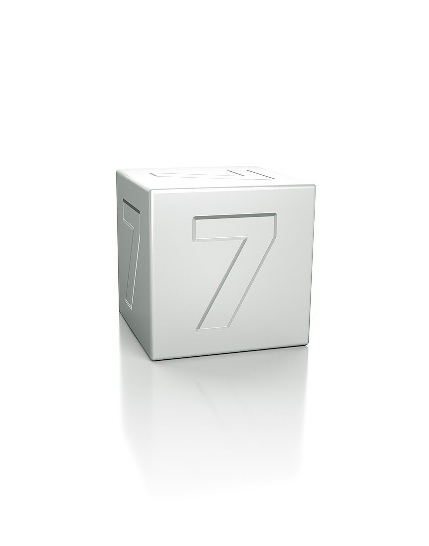 Cube with the number 7 embossed.