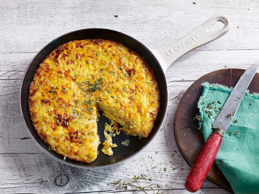 A Spanish tortilla with potato, celery and carrot