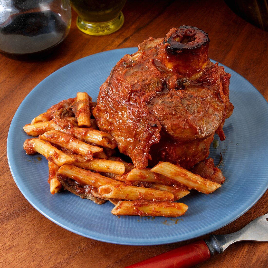 Osso Buco with pasta in tomato sauce
