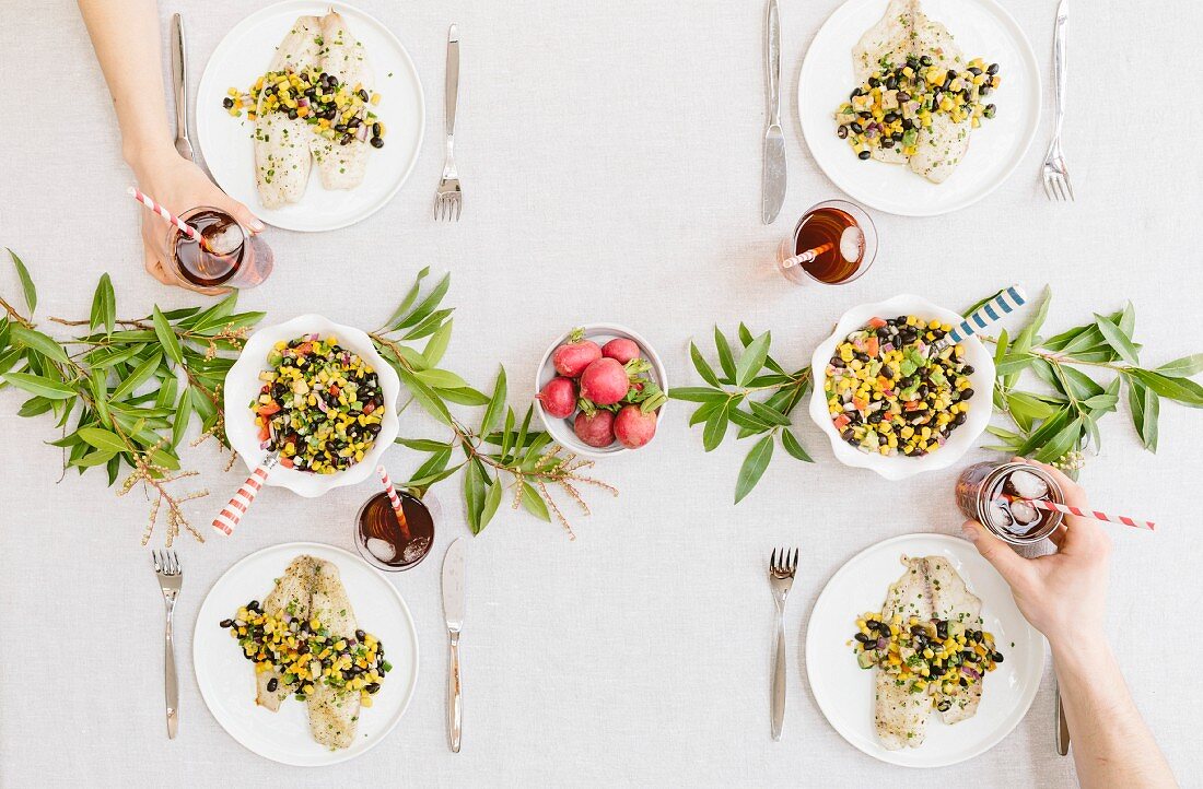 A summery (happy & bright) tablesetting with a portion of Baked Lime and Olive oil tilapia with black bean salsa