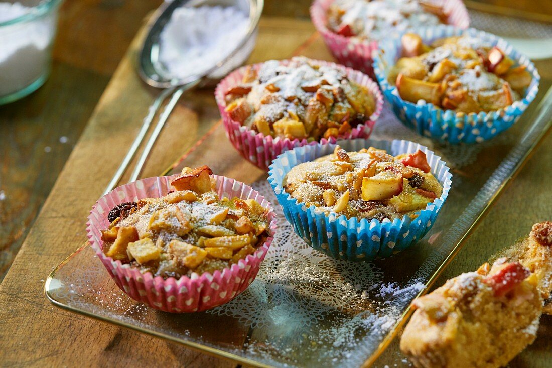 Apple muffins with raisins in colourful paper cases