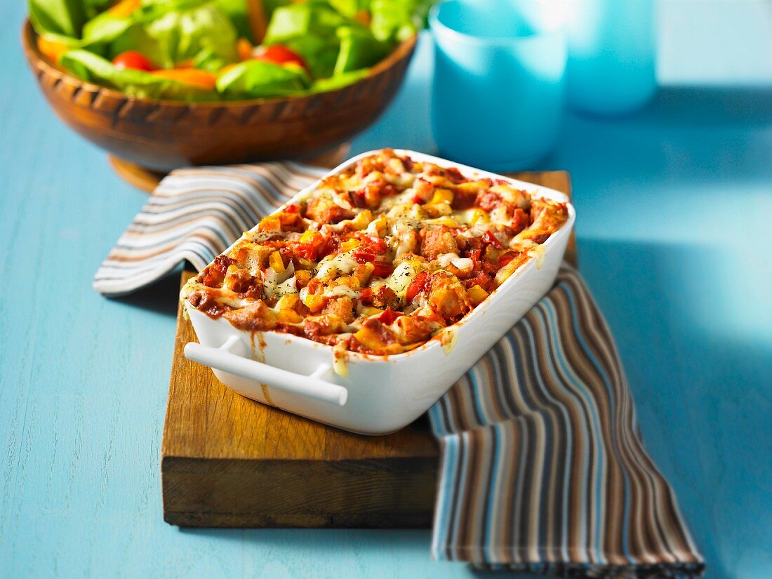 Chicken parmesan with a mixed leaf salad