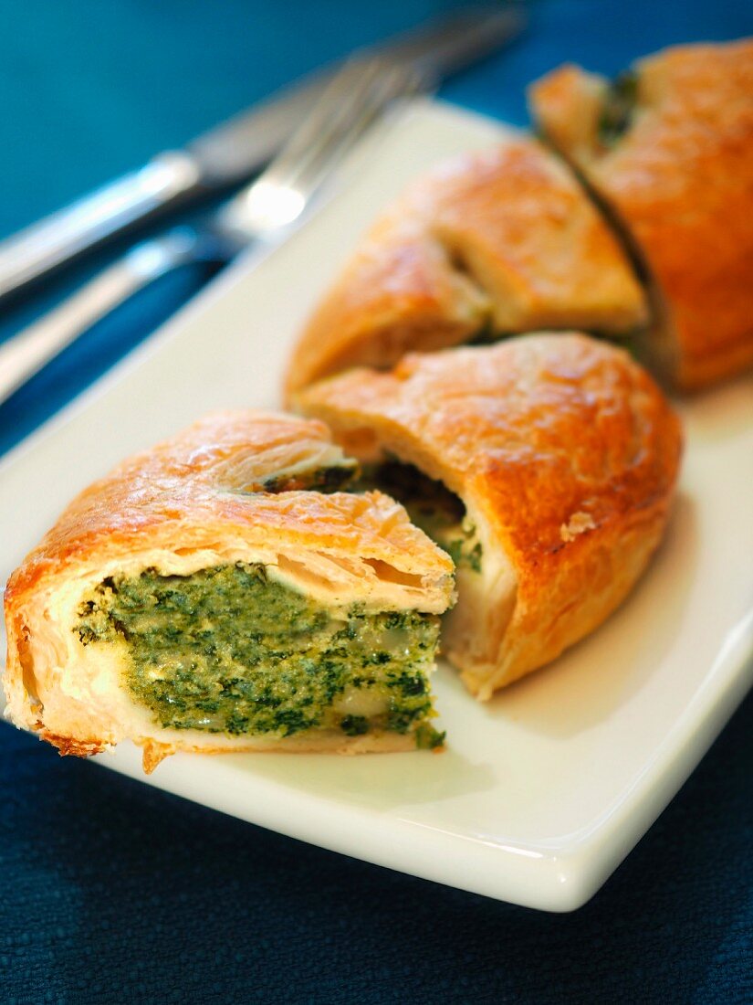 Pasqualina, italian typical Easter savoury cake with eggs and spinach, Italy