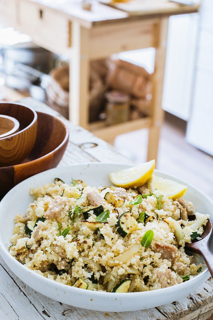 Cauliflower couscous with chicken, grilled zucchini and mint