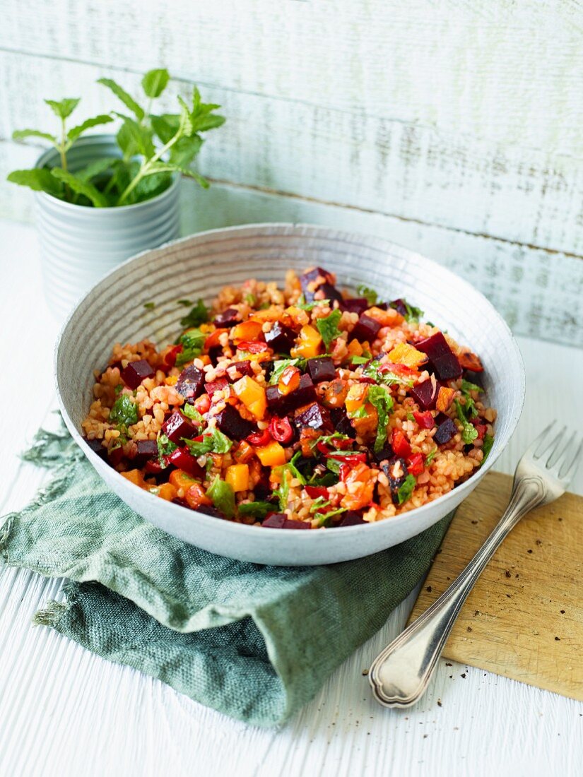 Bulgur wheat with beetroot, peppers and mint