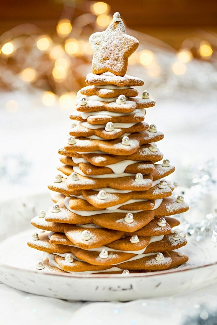 A gingerbread tree with icing sugar and silver beads for Christmas