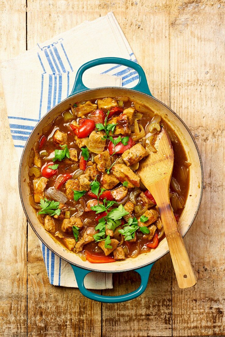 Pork with peppers and fresh parsley