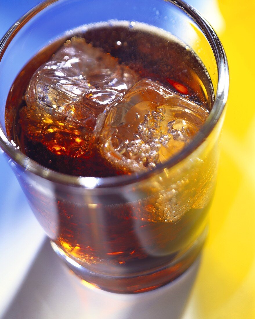 A Glass of Coke with Ice Cubes