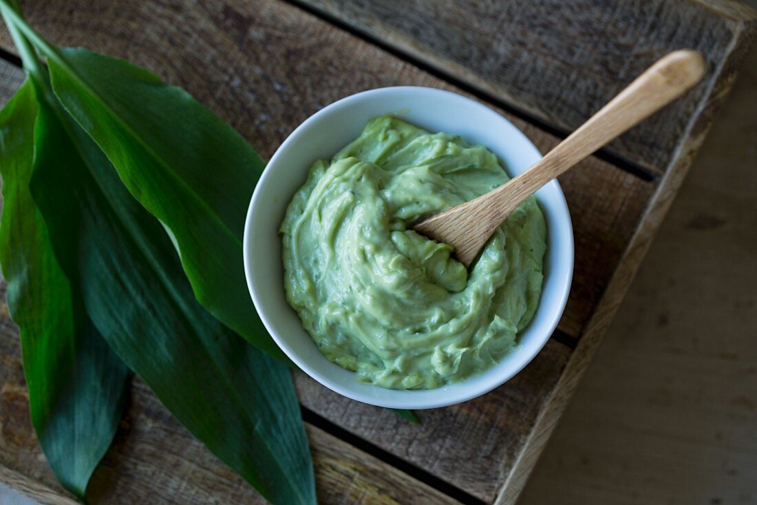 Wild garlic mayonnaise in a small bowl with a spoon