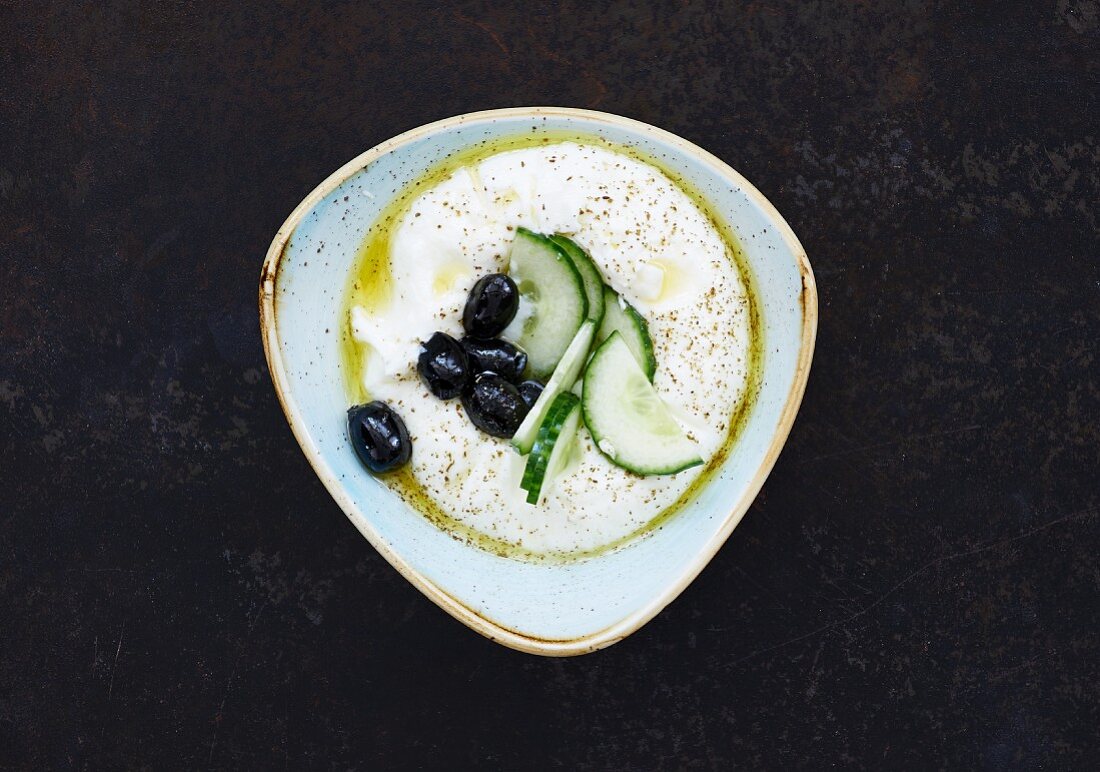 Labneh with olives and cucumbers (fresh cheese, Lebanon)