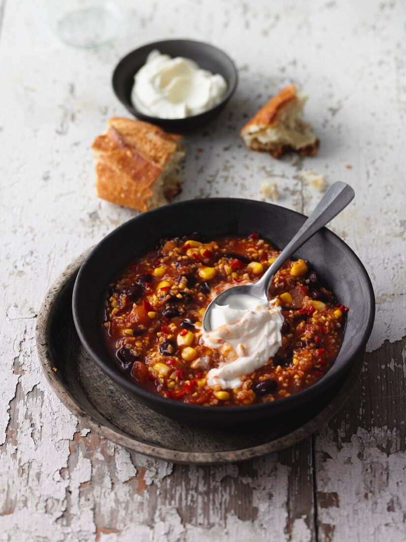 Vegetarian unripe spelt grain chilli with sweet lupin