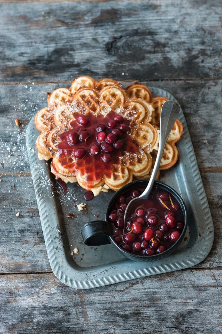 Waffles with cranberry and red wine sauce
