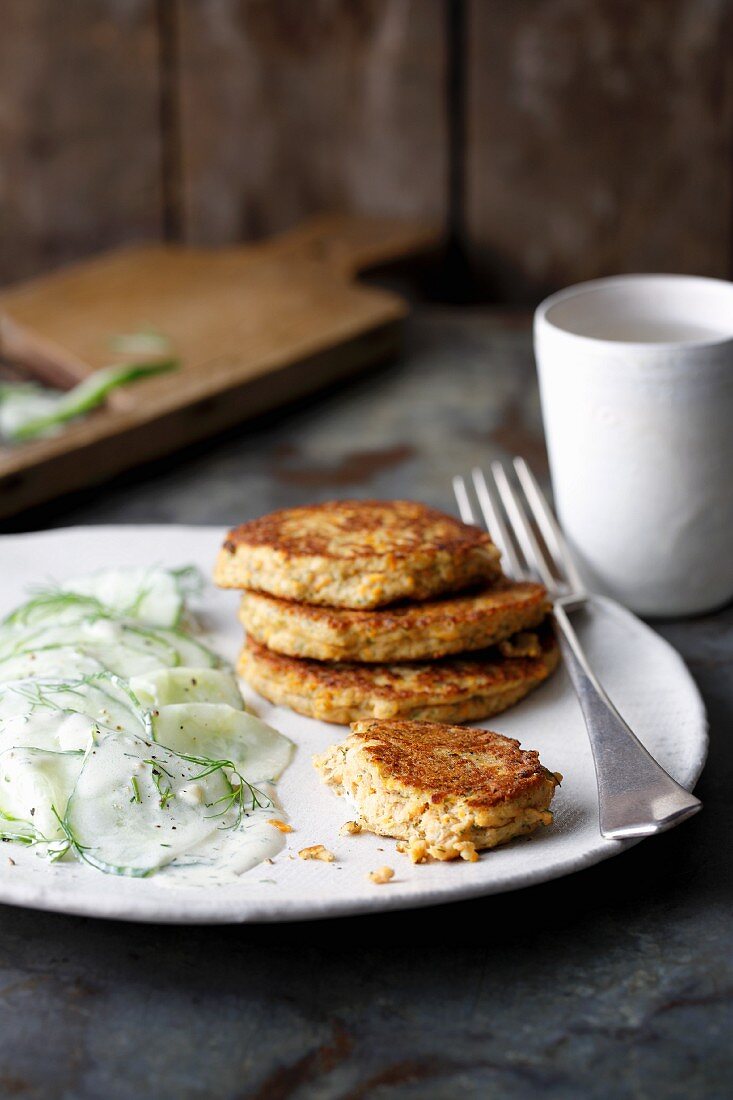 Tuna and carrot fritters with cucumber and dill salad