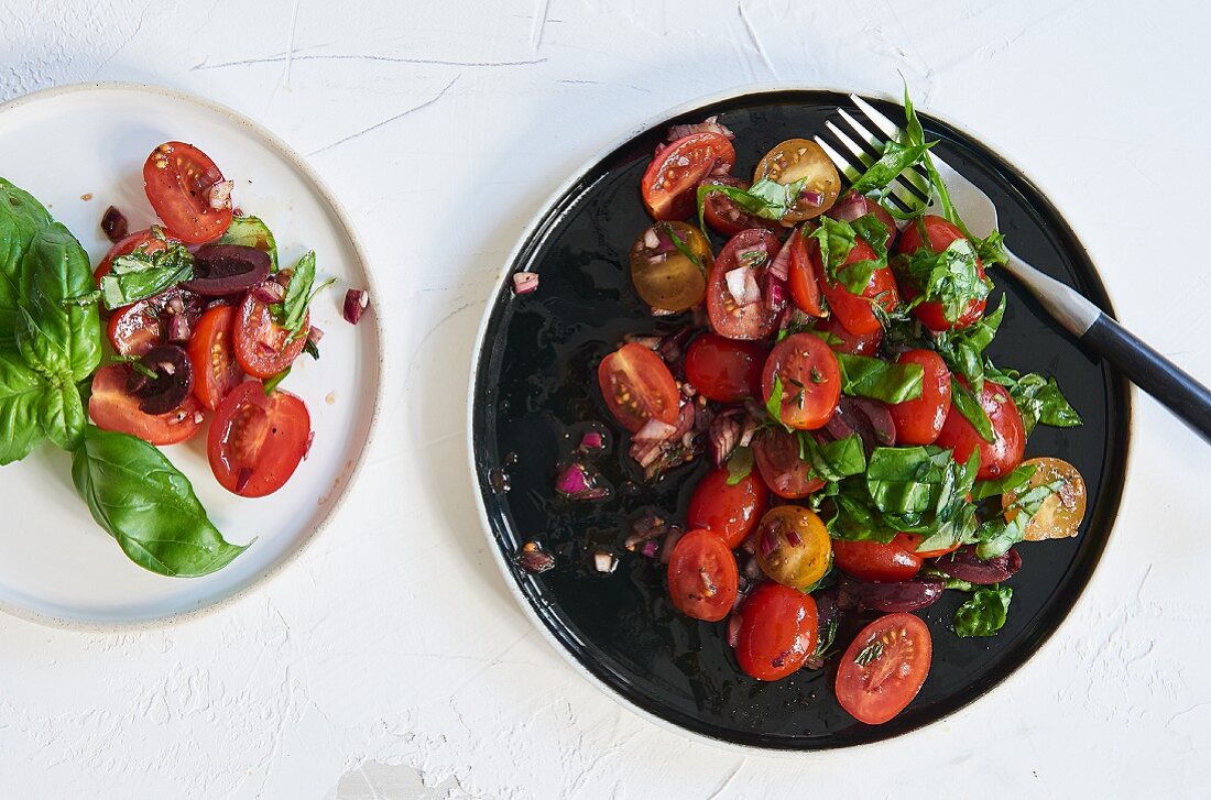 Cherry tomato salad with olives and basil
