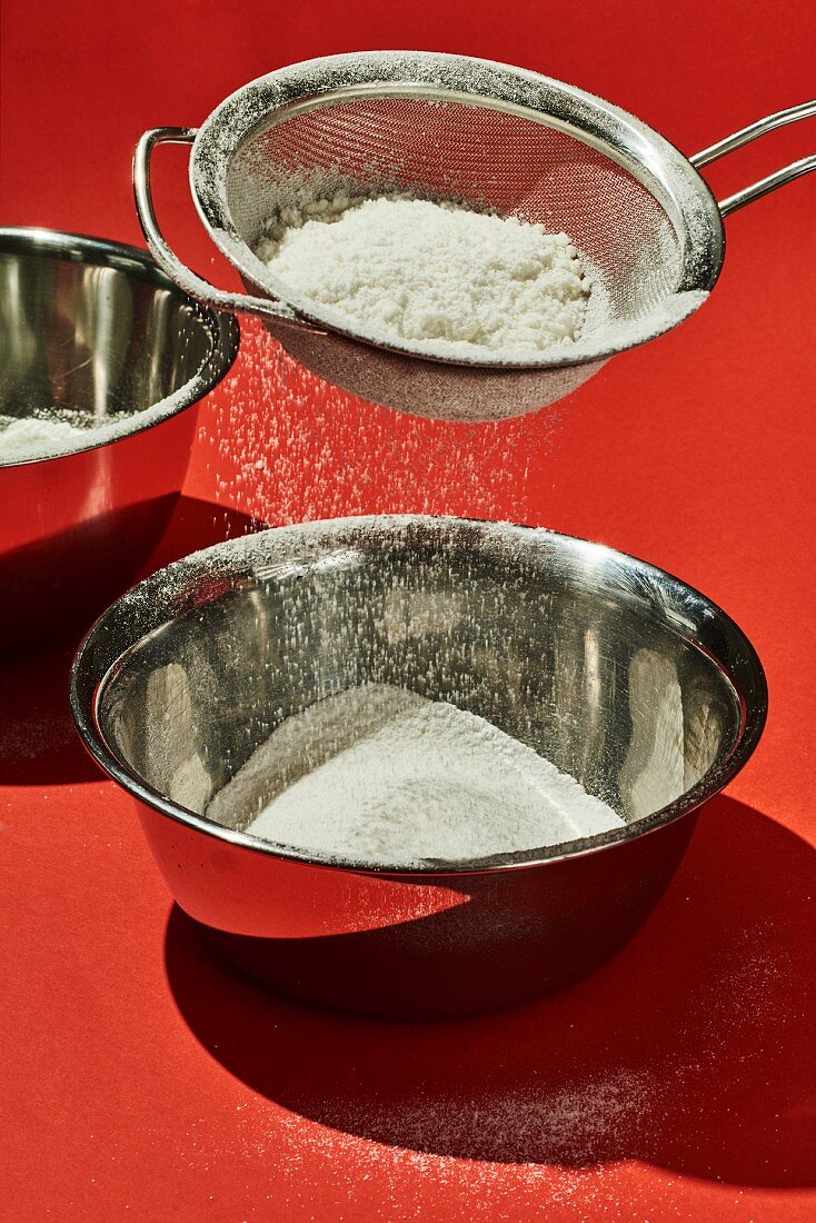 Rice flour being finely sieved