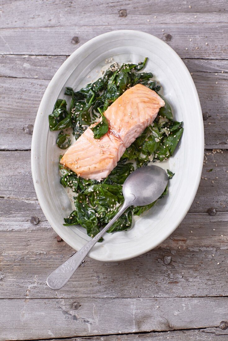Sweet salmon on a bed of sesame spinach