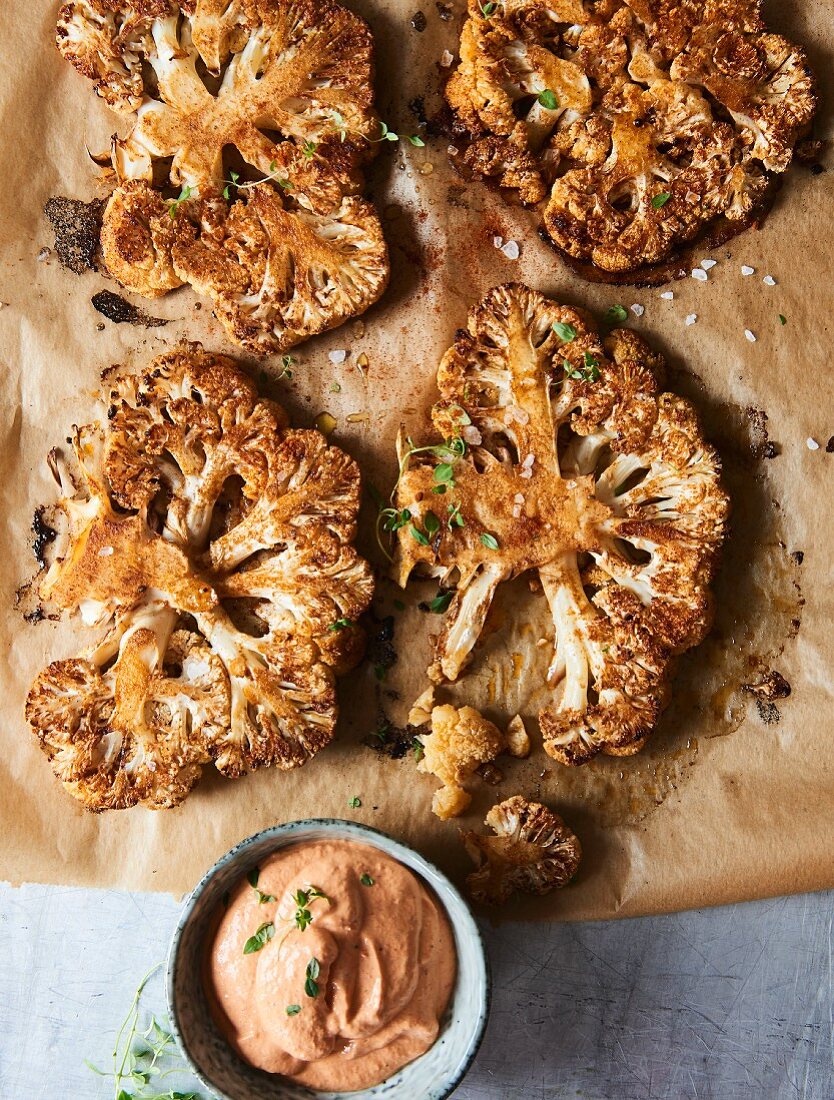 Fried cauliflower steaks with red pepper cream cheese
