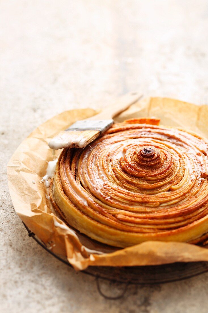 A giant cinnamon swirl made of ready-made flaky pastry