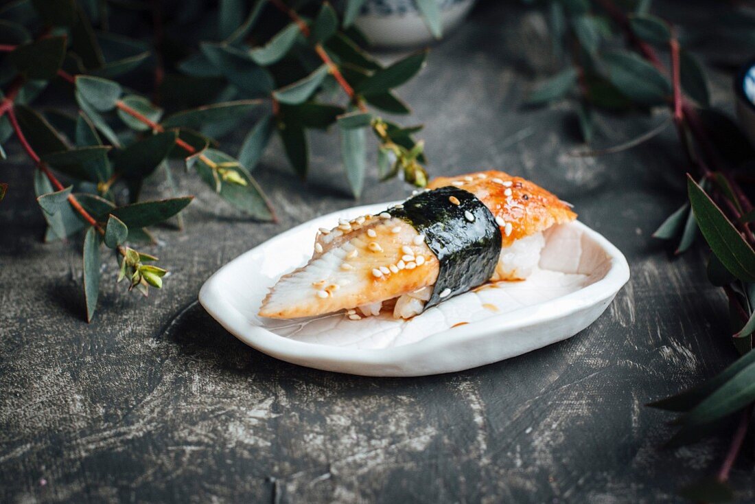 Nigiri sushi with eel and sesame