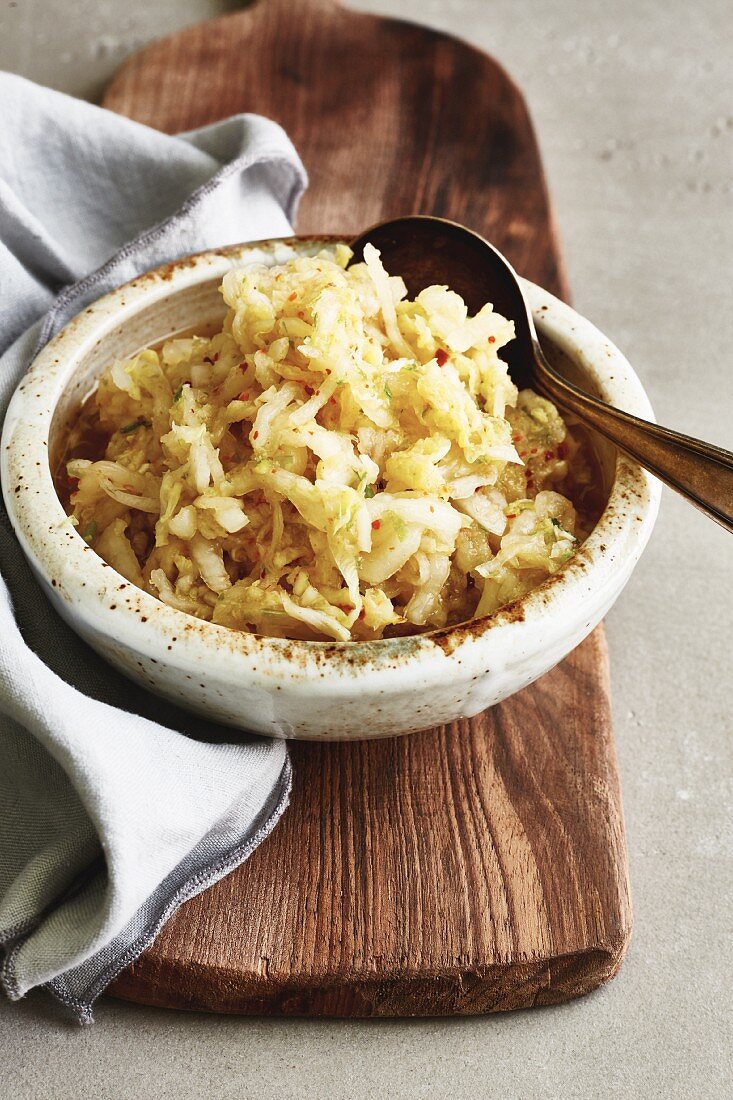 Homemade kimchi made of Chinese cabbage, white radish and chilli flakes